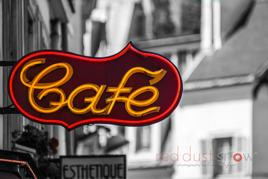 A beautiful neon sign above a cafe on the corner of Rue de Buci and Rue de Seine, St Germaine, Paris