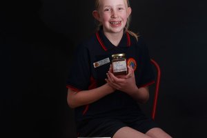 Isabella Berry with honey and other items from NSW Governor 